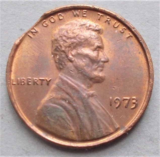 1973-Cent,-Clipped-Planchet